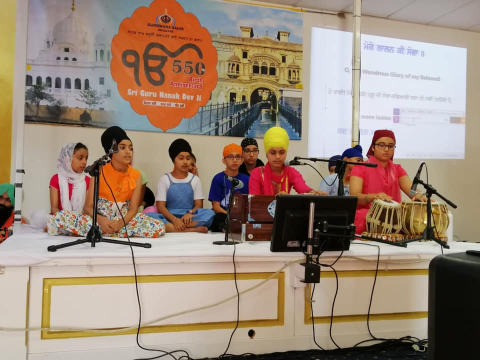 Children learning kirtan at the Gurdwara