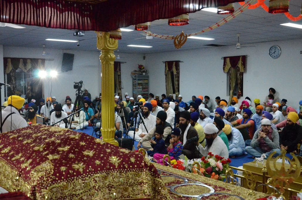 Sri Guru Granth Sahib Ji in Parkash during a Sunday diwan