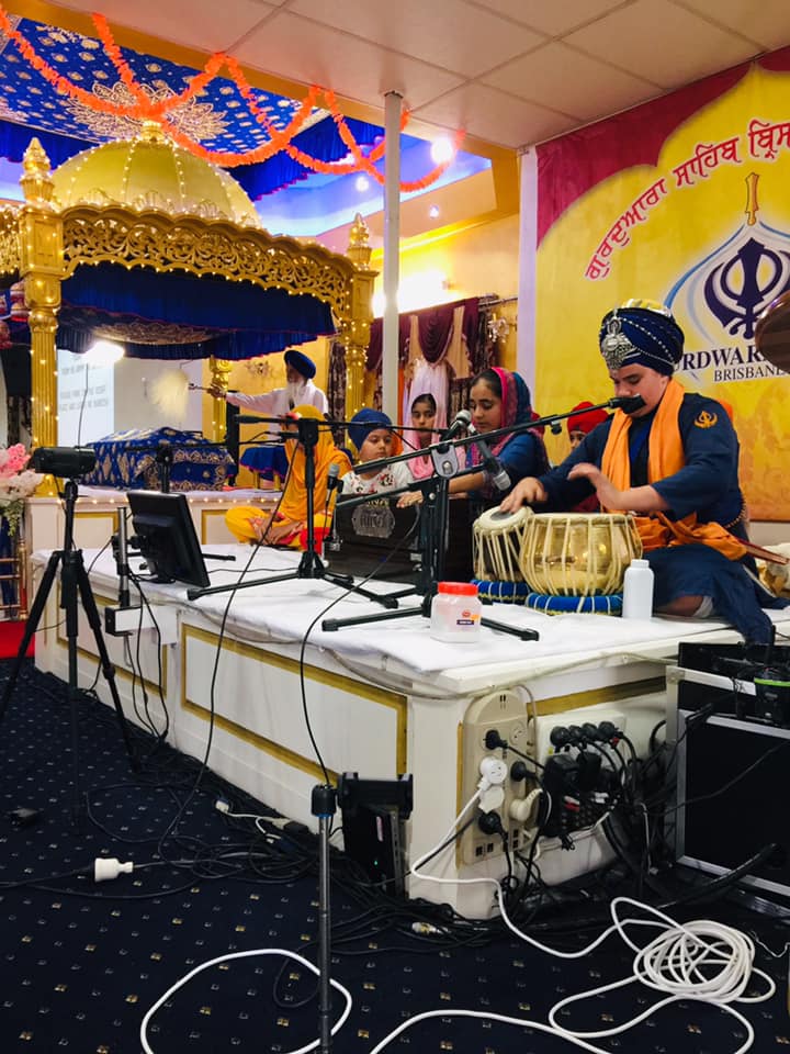 Young kirtanis performing in the Darbar